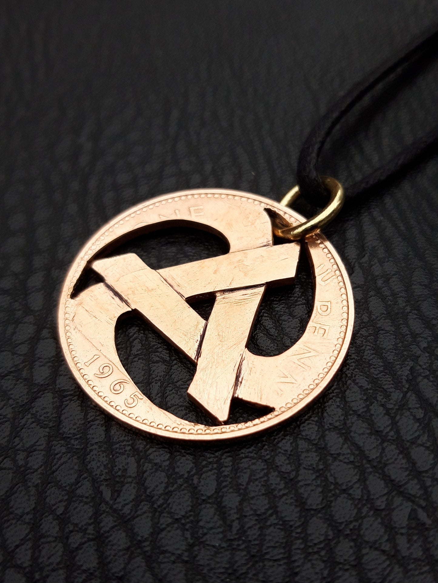 Rolling anarchy symbol pendant